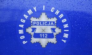 Na zdjęciu widzimy gwiazdę policyjną oraz napis: Policja 112. Pomagamy i chronimy.